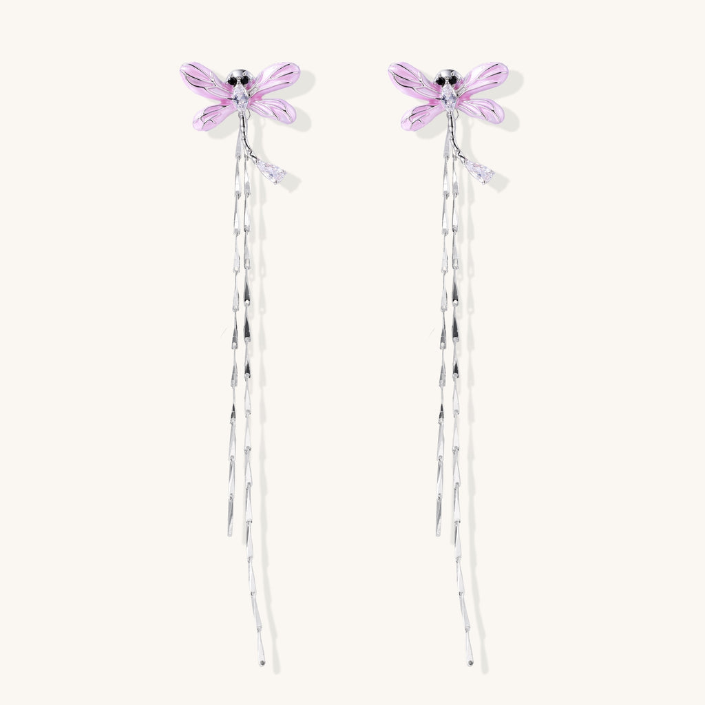 Long dangle earrings with purple dragonfly charms and crystal chains on white background, gold-plated finish.